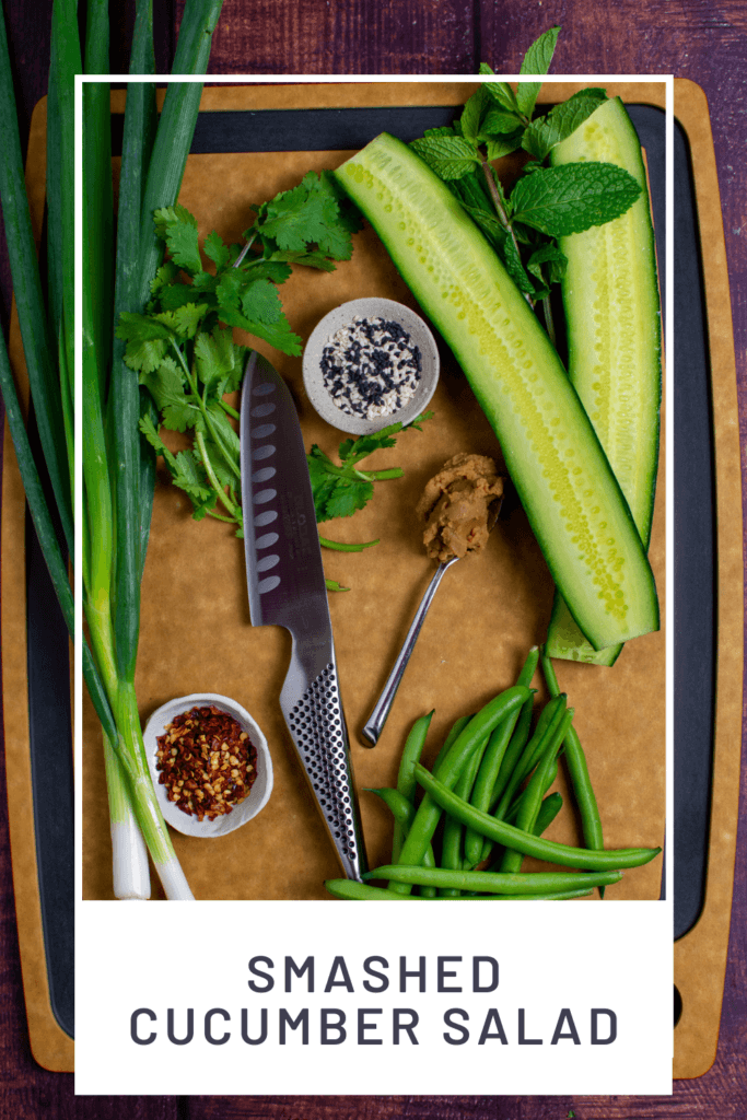 smashed cucumber salad ingredients on chopping board