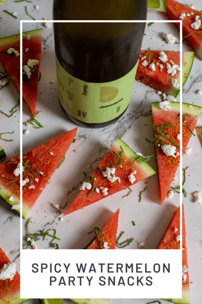 watermelon topped with togaroshi, mint & feta. Bottle of Jeanneret riesling next to them