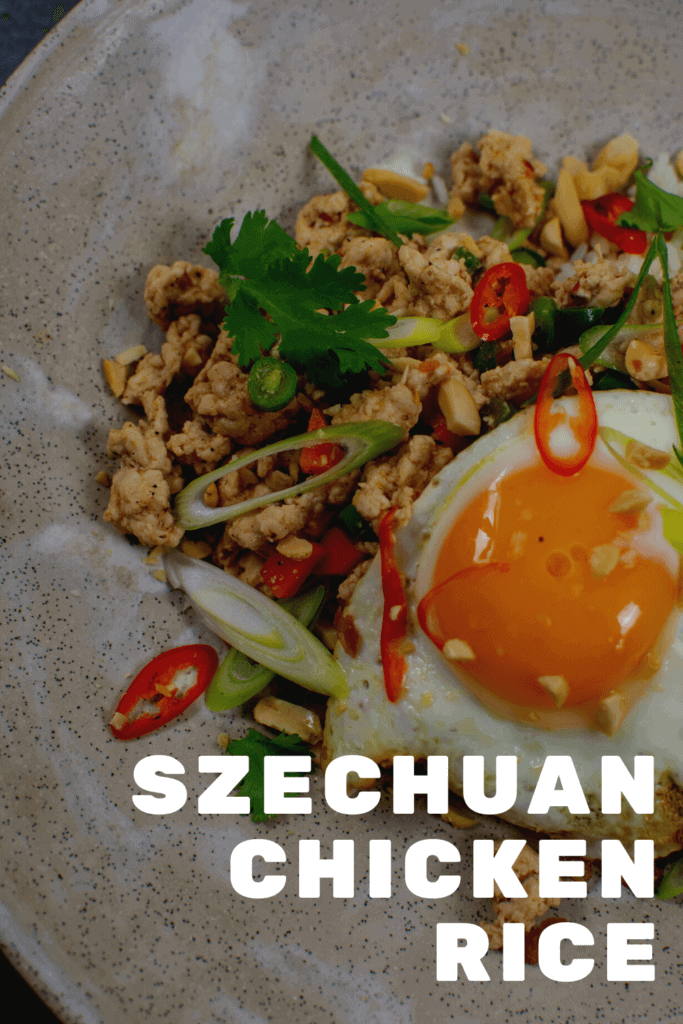 Szechuan fried chicken, rice and fried egg in a bowl