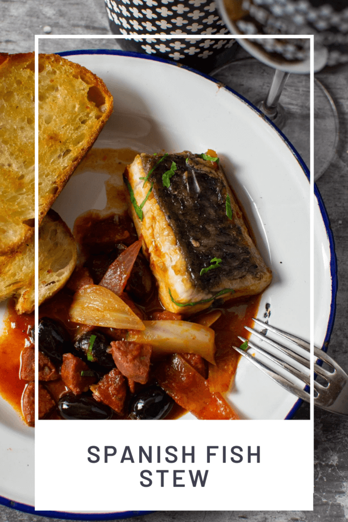 spanish fish stew, grilled bread and glass of heirloom wine