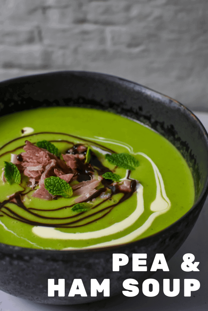 A bowl of pea & ham soup on kitchen countertop