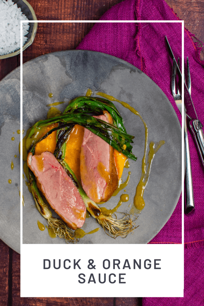 perfectly cooked duck breast, carrot puree & orange sauce on a made of australia plate
