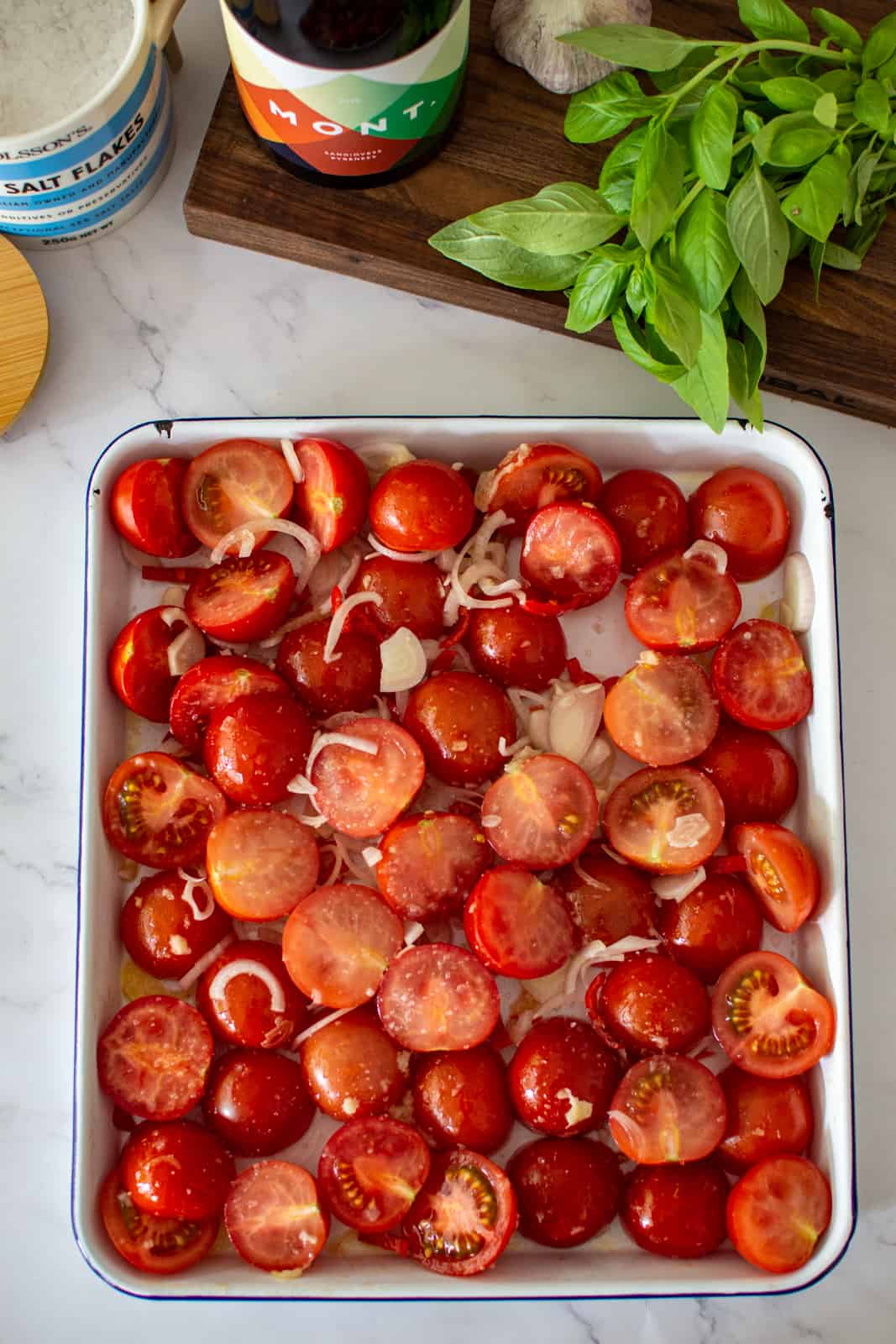 tomatoes, chili, garlic & shallots on a roasting tray