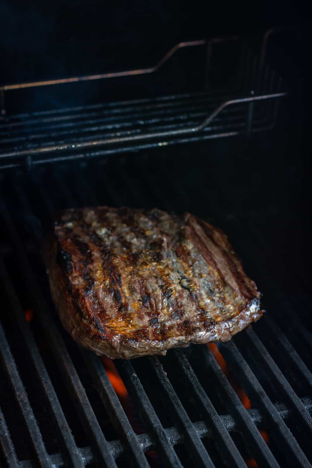 bavette steak grilling on BBQ