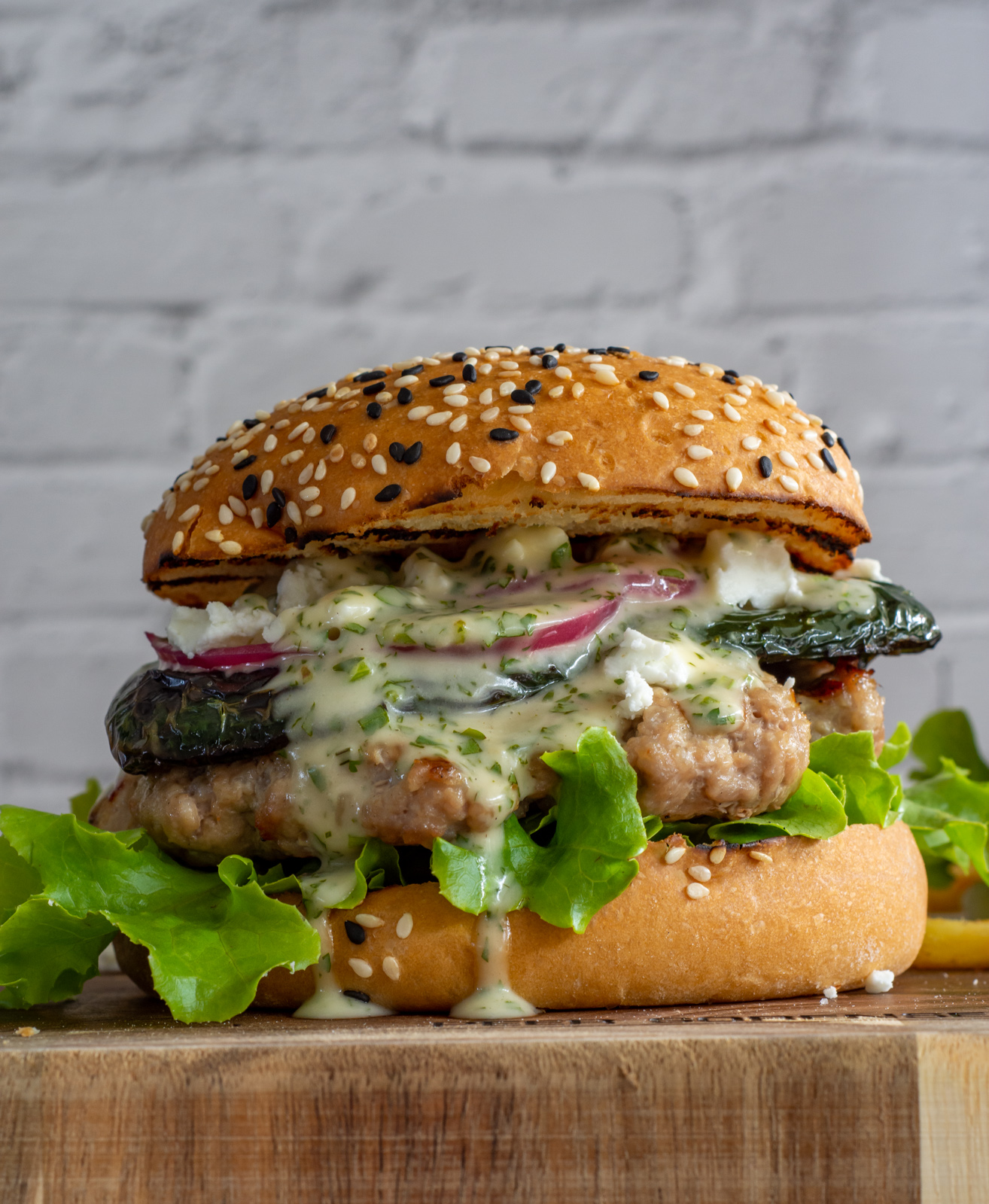 Mexican pork burger on a wooden board 