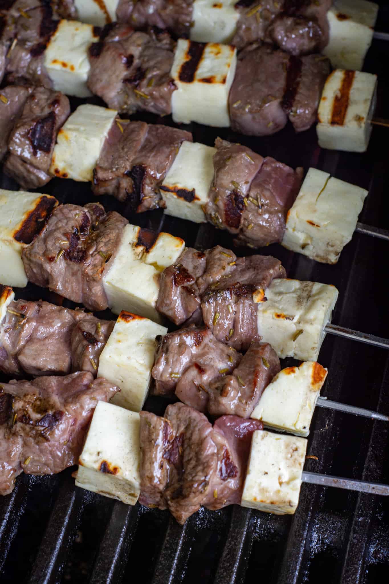 lamb skewers being grilled on the BBQ