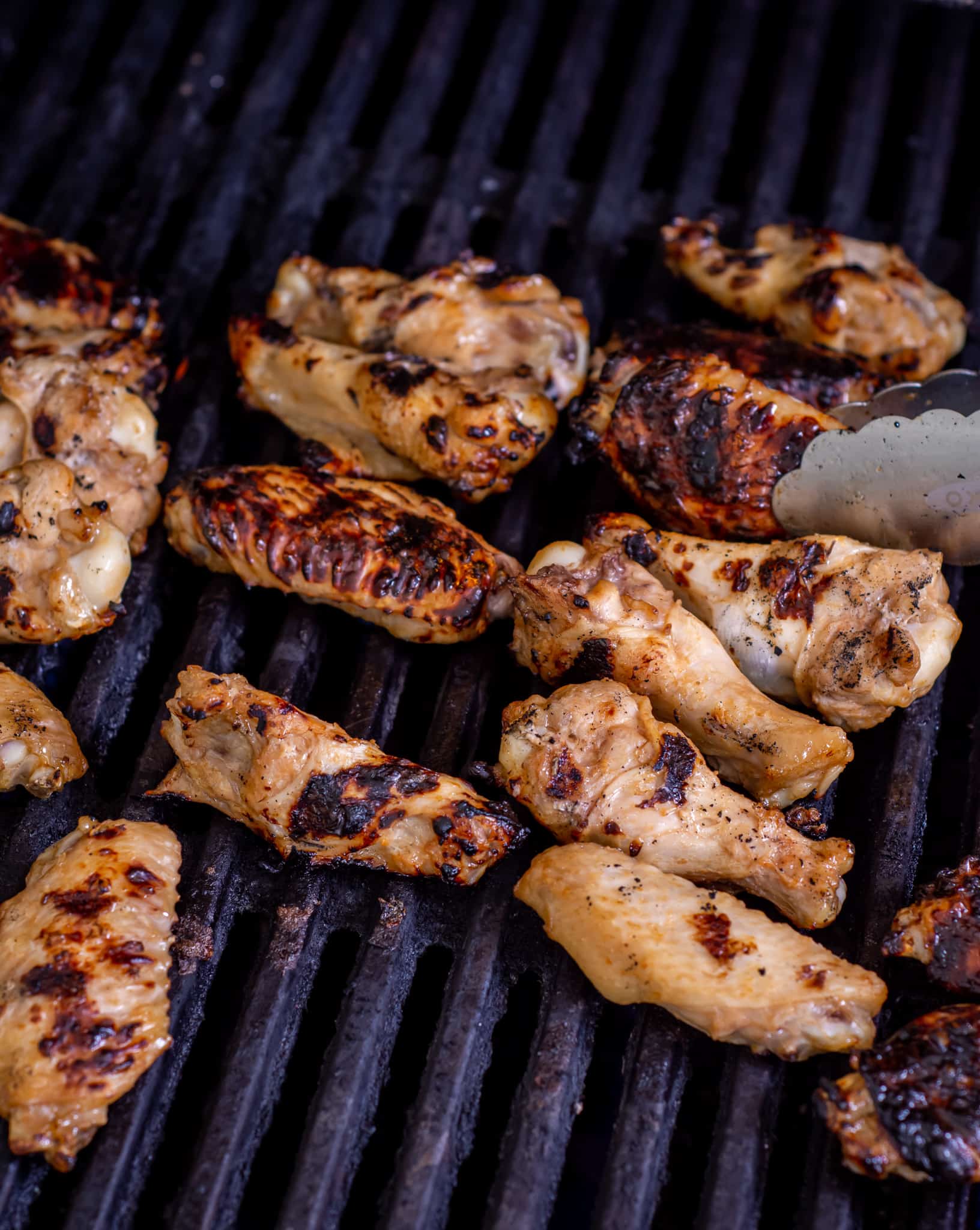 chicken nibbles being grilled on the bbq